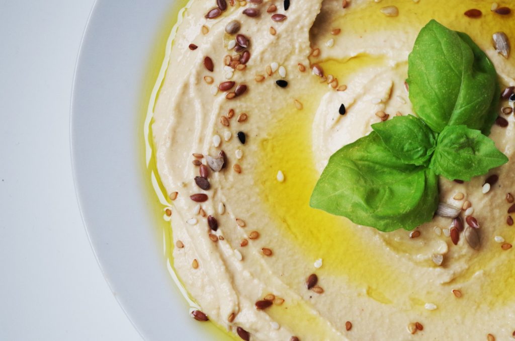 A picture of hummus, as part of healthy vegan living on a budget